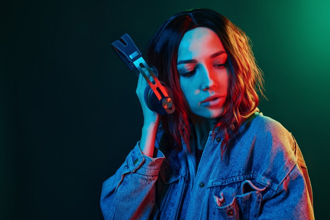 portrait-of-young-girl-that-listening-to-music